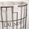 Cesta de ropa metálica con ruedas Alt. 56 cm | Maisons du Monde